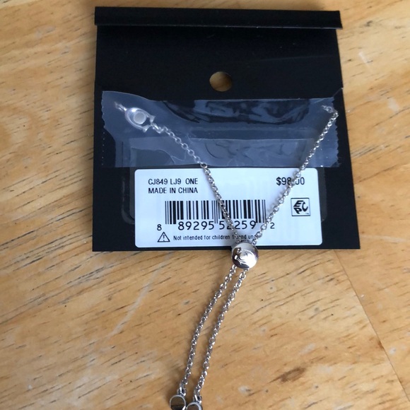 Coach Silver Tone Slider Bracelet Gold Tone Pretzel Charm Crystal Accent NWT - Picture 7 of 14